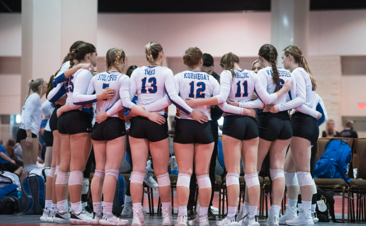 Girls volleyball team huddle